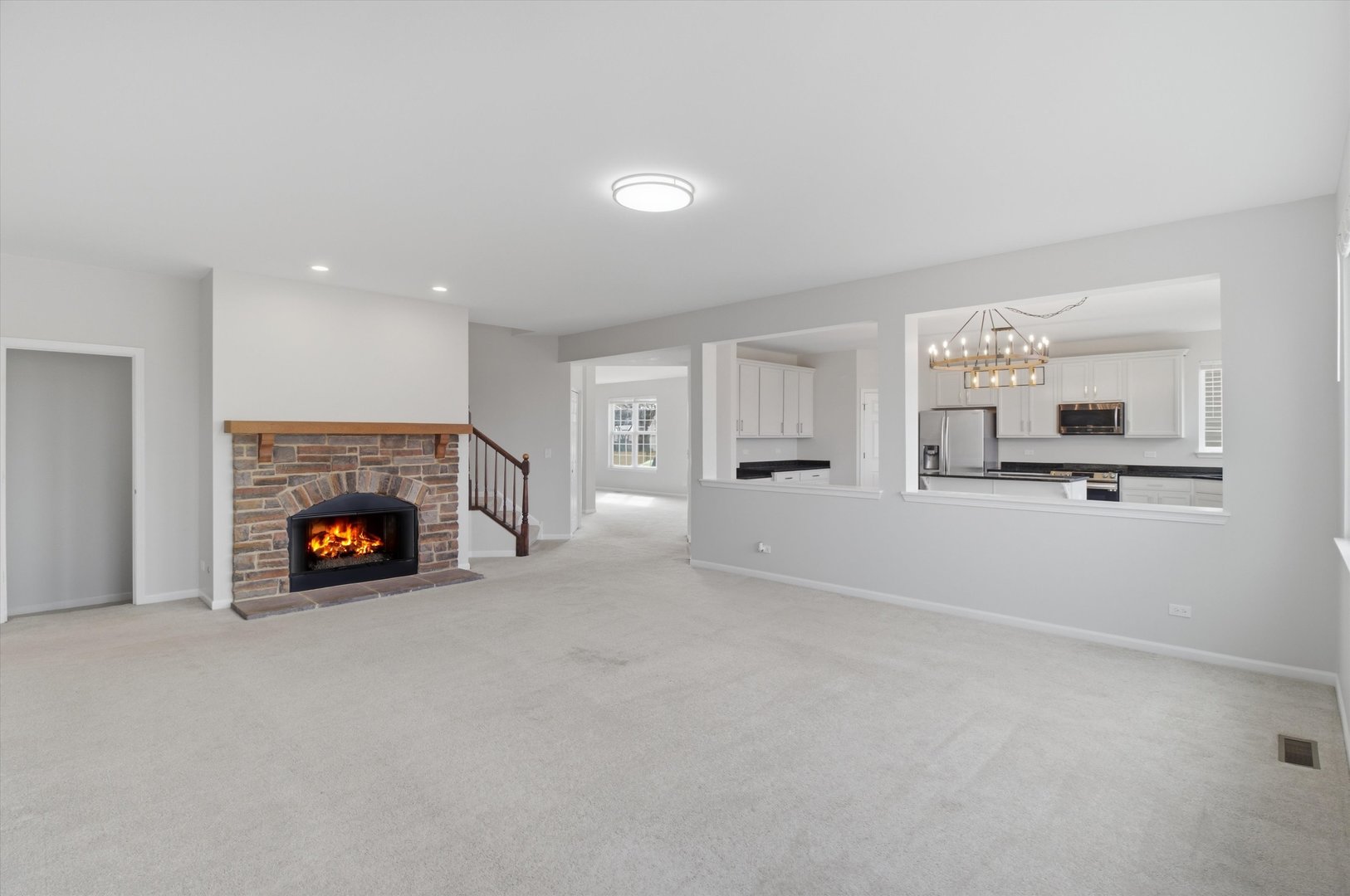 2511 Hennig Road Hampshire, IL 60140 - Photo 3 of 44 a view of a livingroom with a fireplace