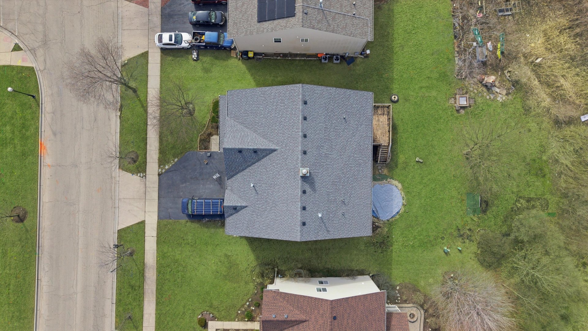 2511 Hennig Road Hampshire, IL 60140 - Photo 37 of 44 an aerial view of a house with a garden and trees