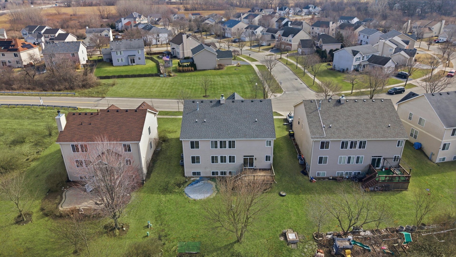 2511 Hennig Road Hampshire, IL 60140 - Photo 38 of 44 an aerial view of residential houses with outdoor space and parking