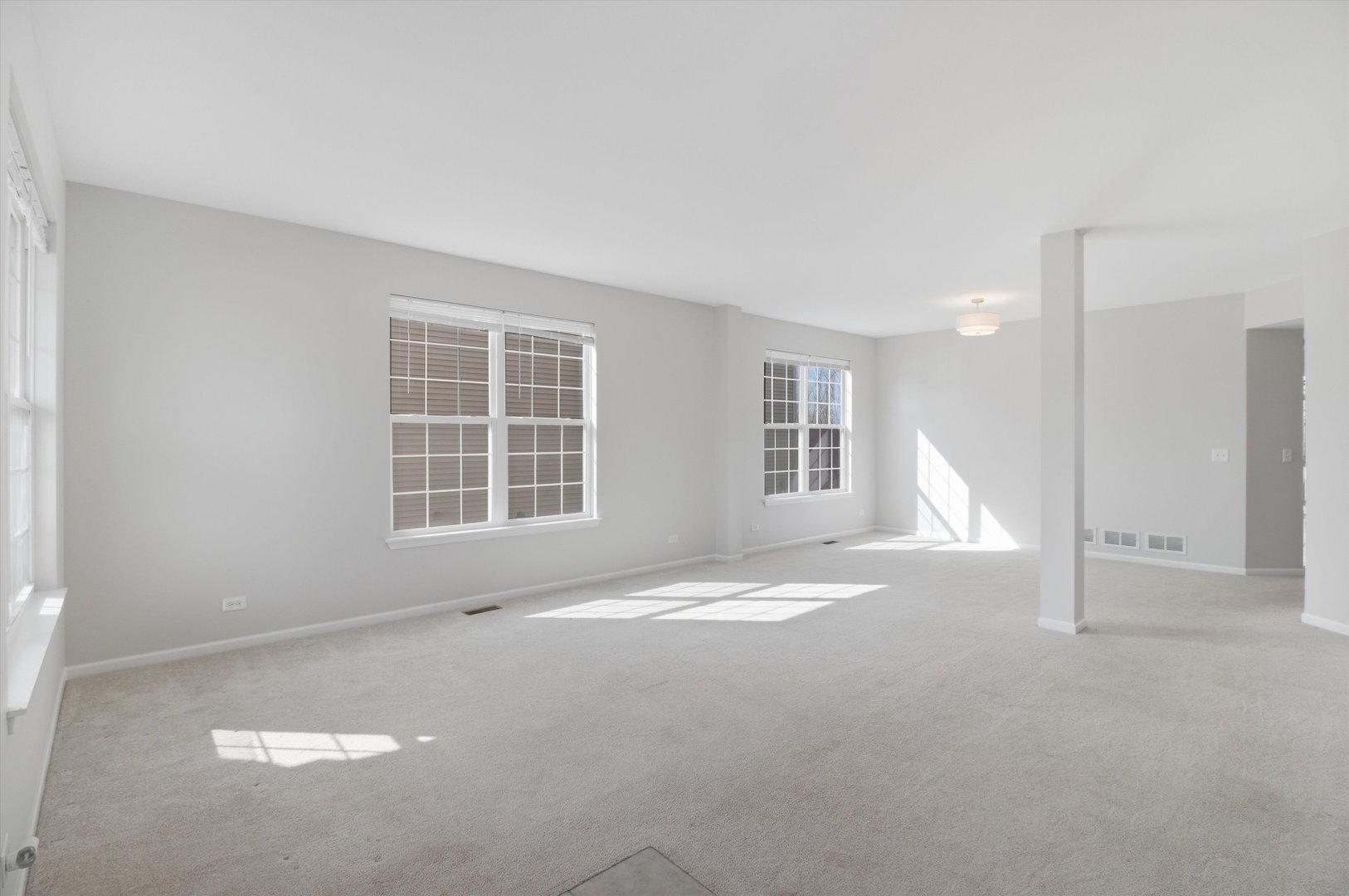 2511 Hennig Road Hampshire, IL 60140 - Photo 4 of 44 an empty room with windows