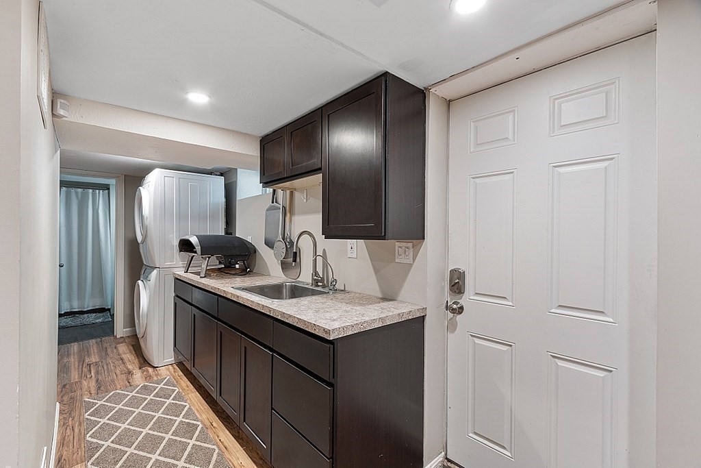 10 Truro Street Worcester, MA 01603 - Photo 22 of 32 a bathroom with a sink and a mirror