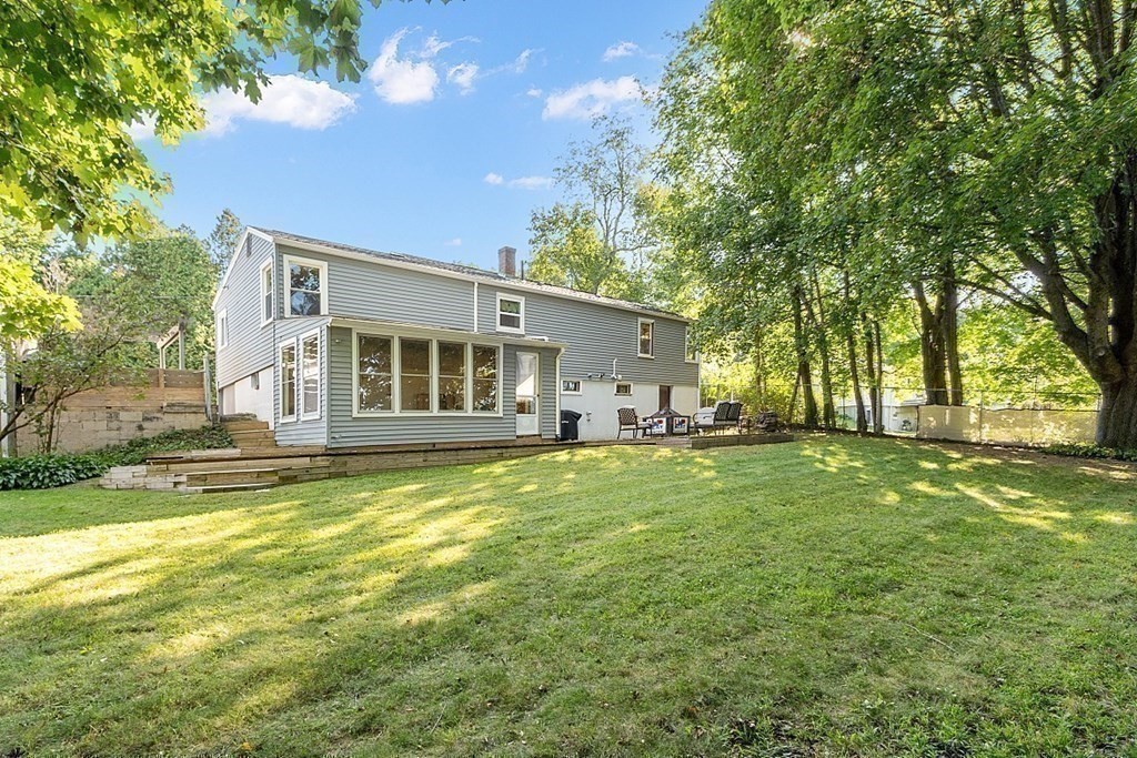 10 Truro Street Worcester, MA 01603 - Photo 28 of 32 a backyard of a house with table and chairs