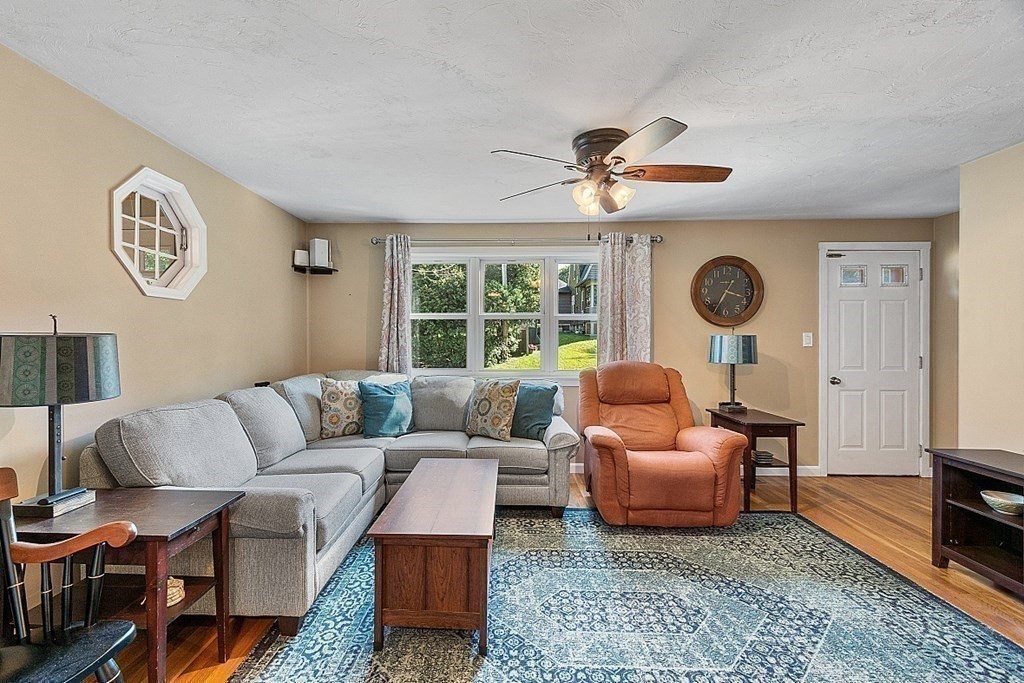 10 Truro Street Worcester, MA 01603 - Photo 10 of 32 a living room with furniture and a large window