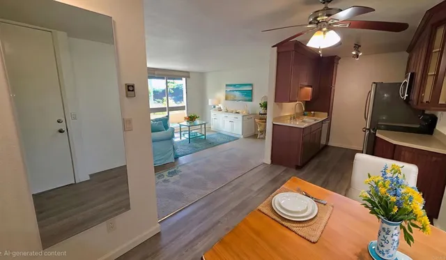 a view of a kitchen and dining room