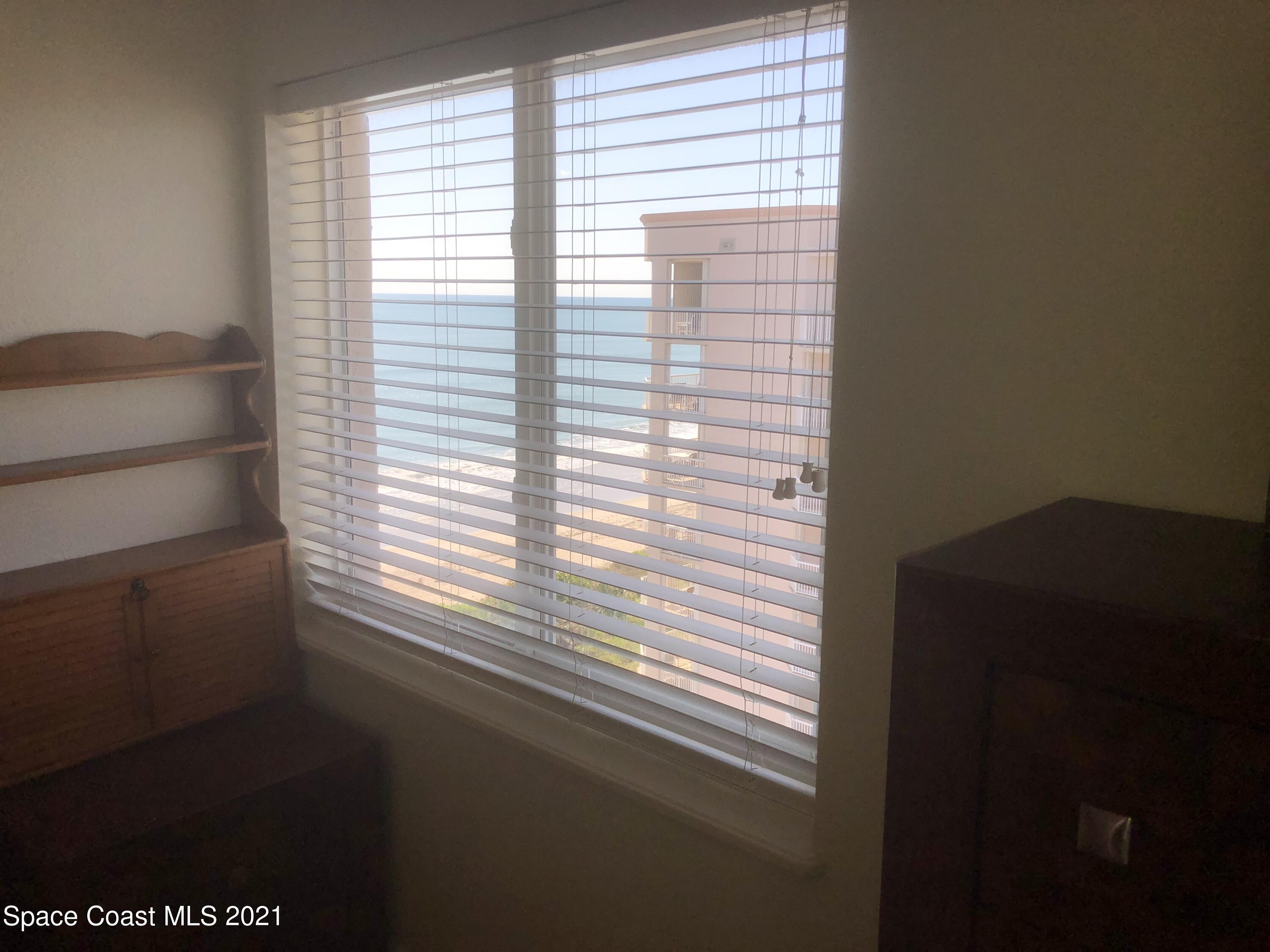 2075 Florida A1A, Unit 2705 Indian Harbour Beach, FL 32937 - Photo 15 of 30 a view of a small space with a window