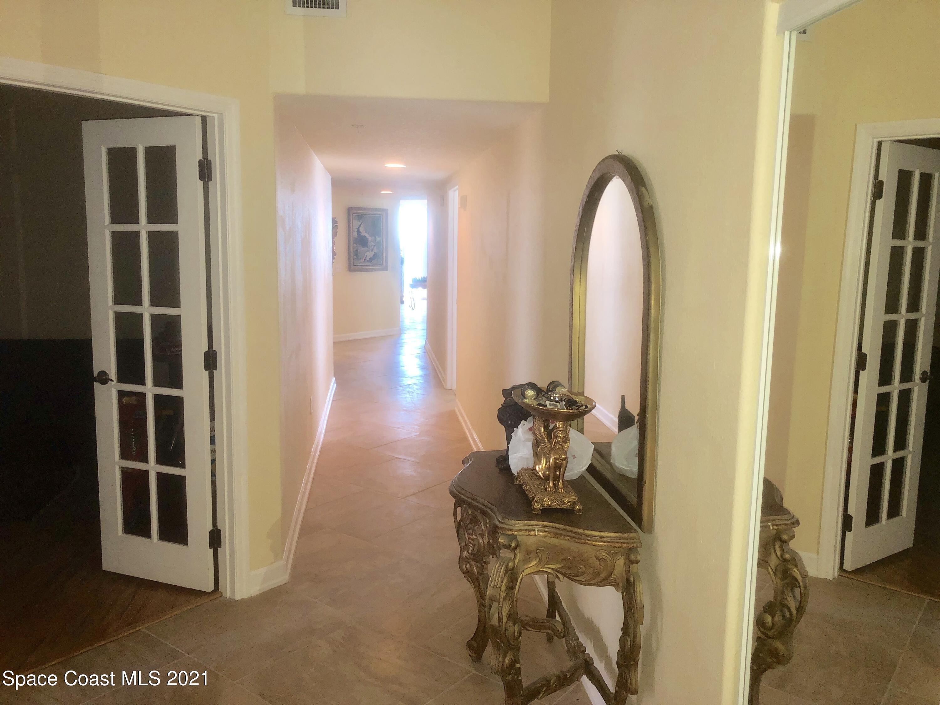 2075 Florida A1A, Unit 2705 Indian Harbour Beach, FL 32937 - Photo 10 of 30 a view of a entryway door of the house