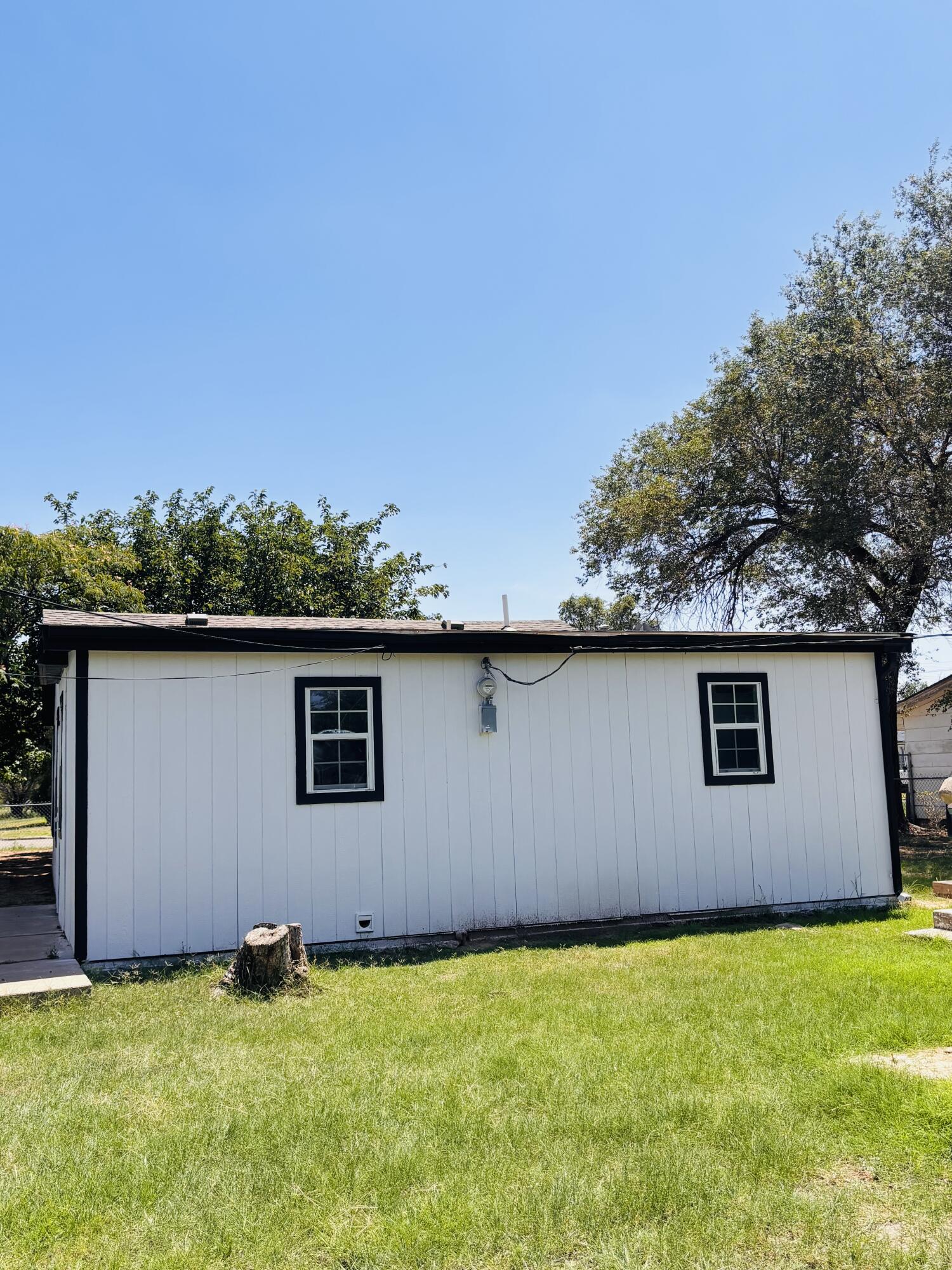 1108 41st Street Lubbock, TX 79412 - Photo 21 of 21 a backyard of a house with lots of green space