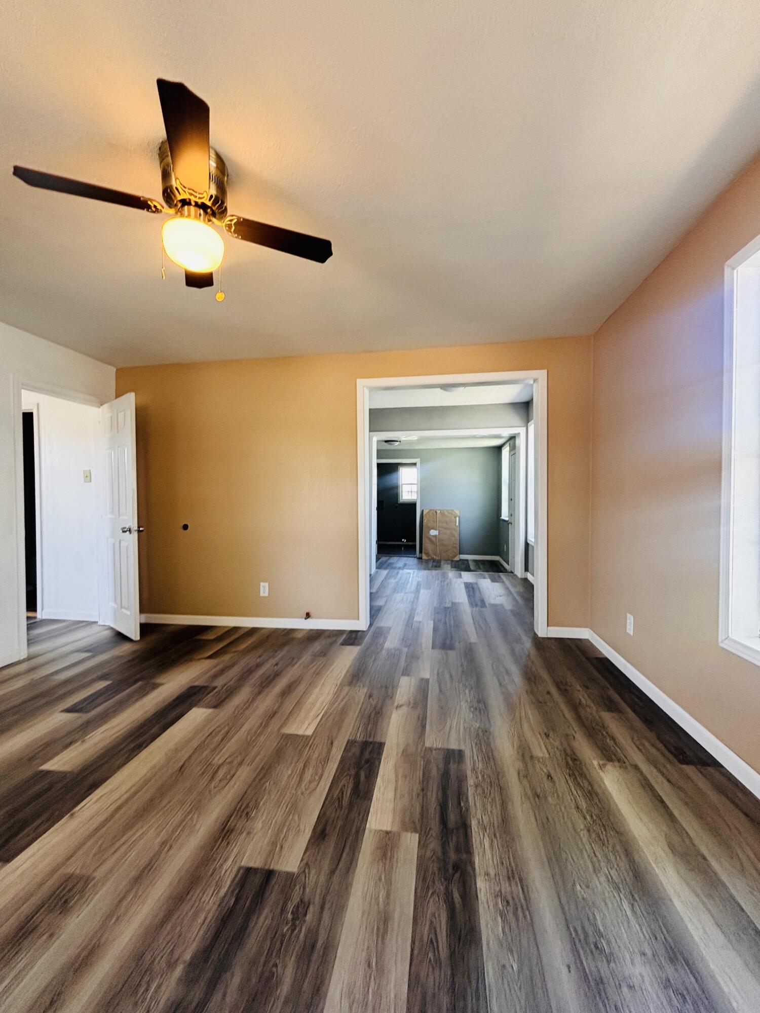 1108 41st Street Lubbock, TX 79412 - Photo 5 of 21 a view of empty room with wooden floor