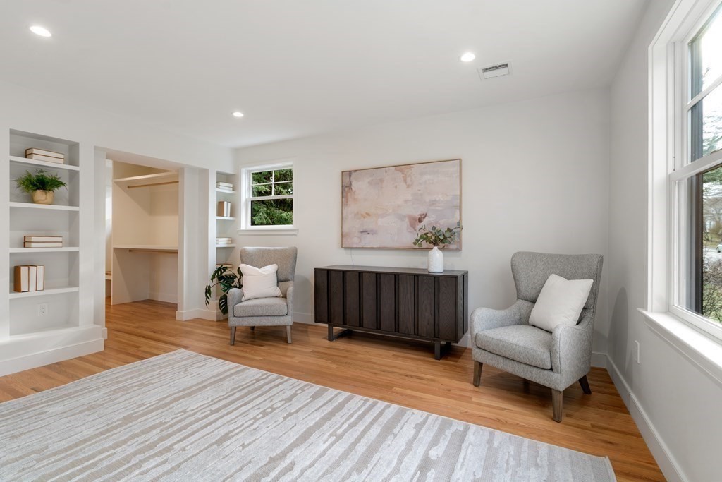 28 Tyler Road Belmont, MA 02478 - Photo 15 of 25 a living room with furniture and a wooden floor