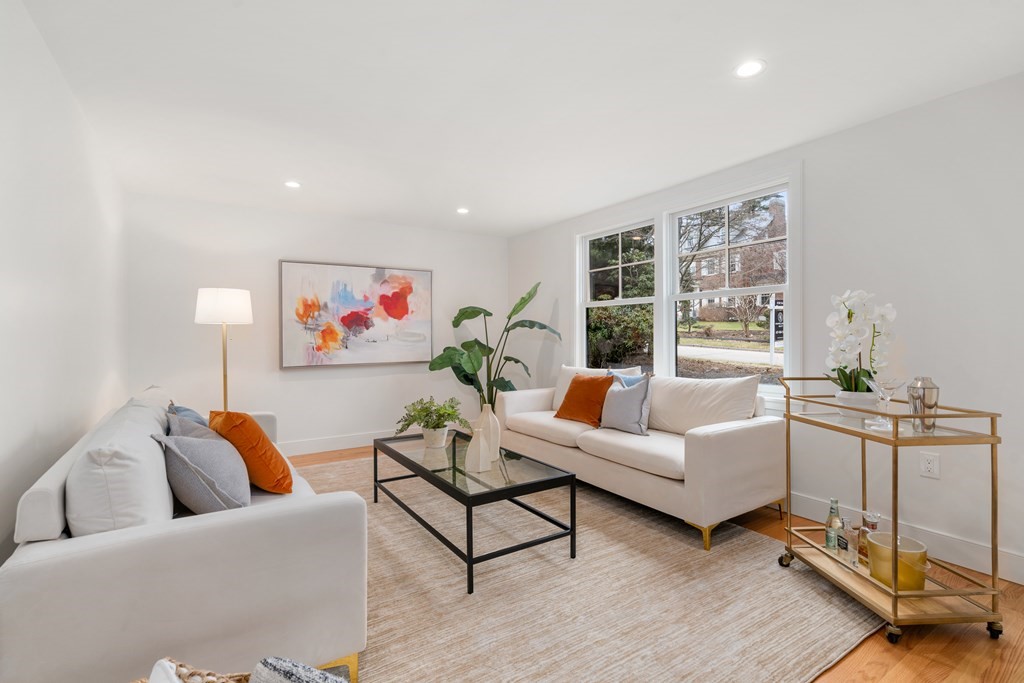 28 Tyler Road Belmont, MA 02478 - Photo 2 of 25 a living room with furniture and a floor to ceiling window