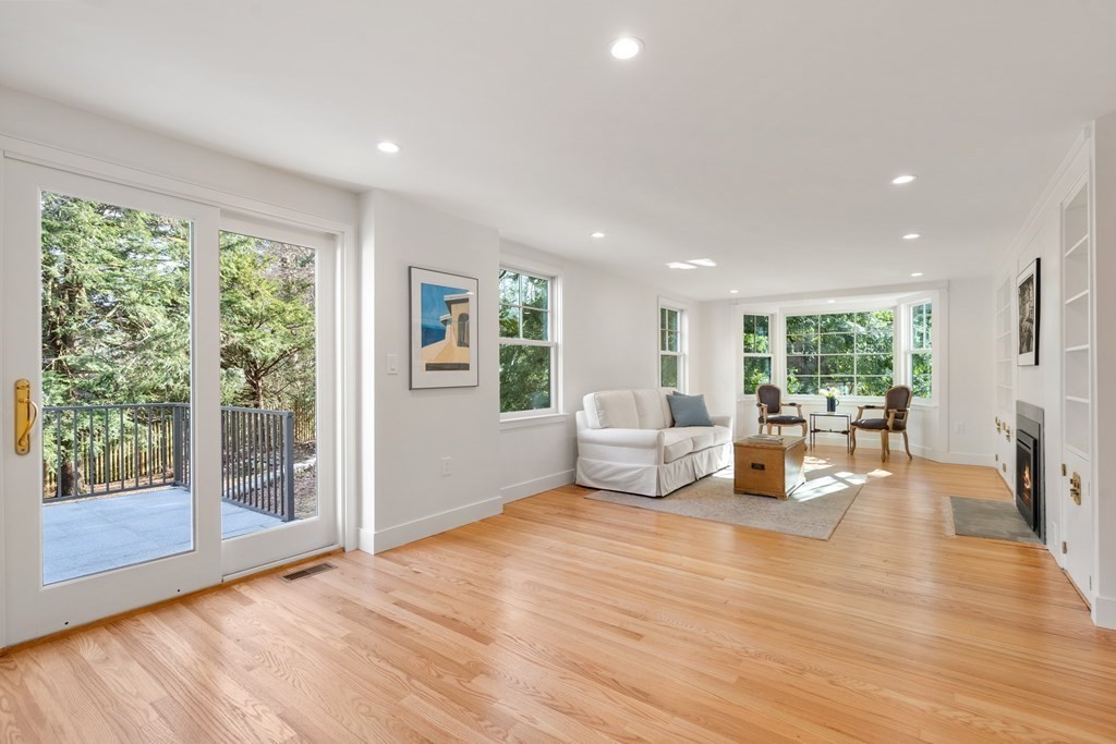 28 Tyler Road Belmont, MA 02478 - Photo 4 of 25 a living room with furniture and a large window