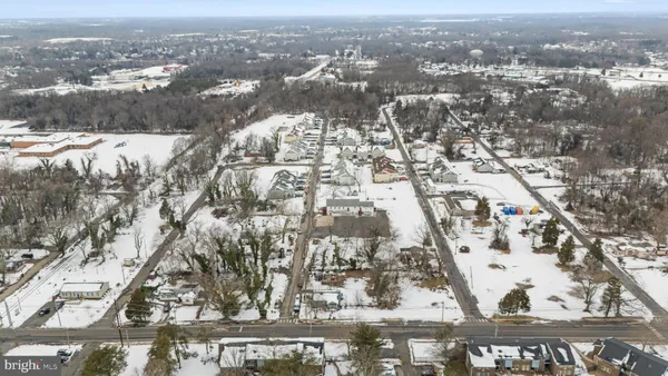 an aerial view of residential building and parking space