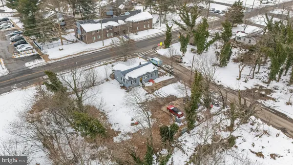 a white building with a trees