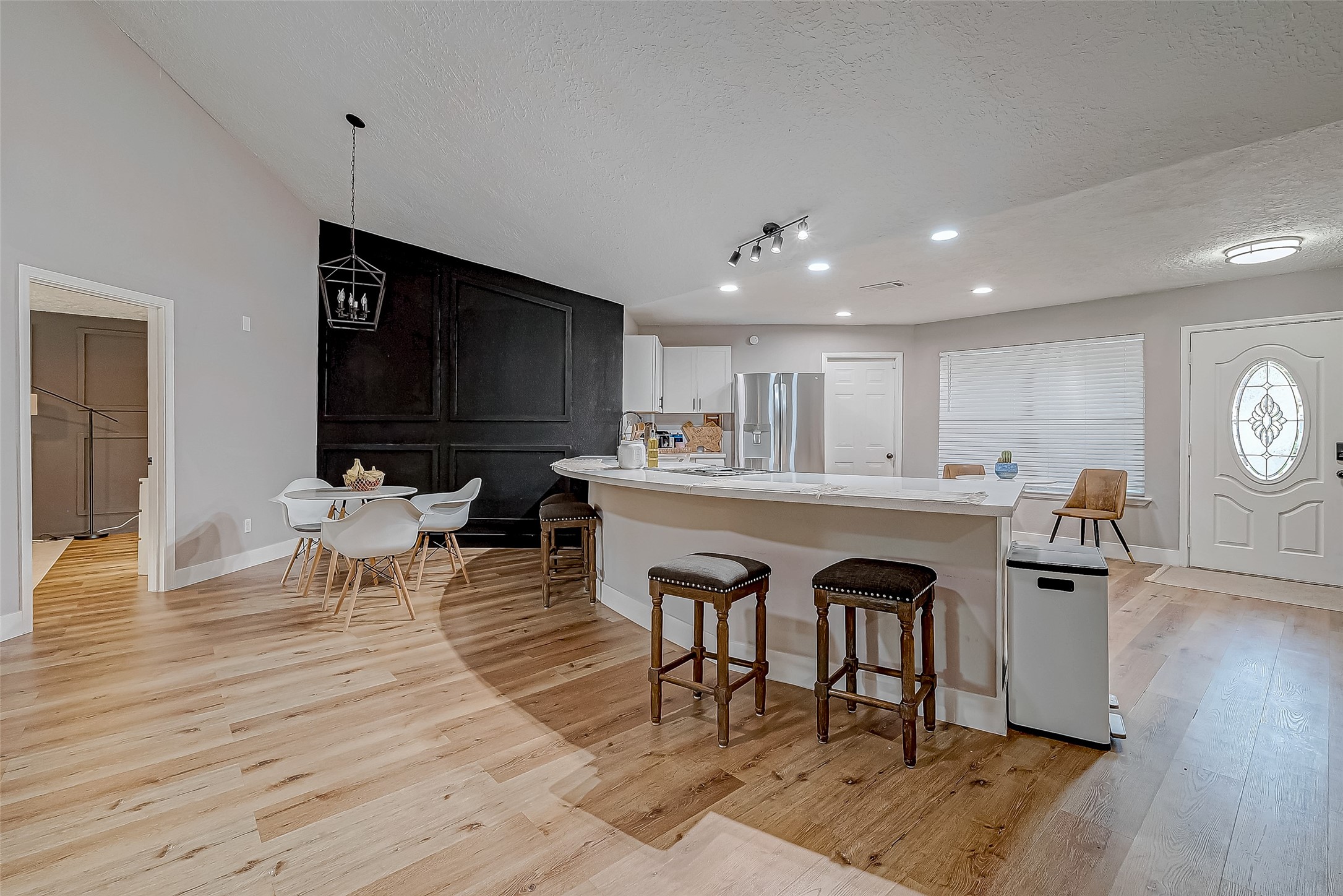 17431 Typhoon Way Crosby, TX 77532 - Photo 13 of 34 a living room with furniture and a wooden floor