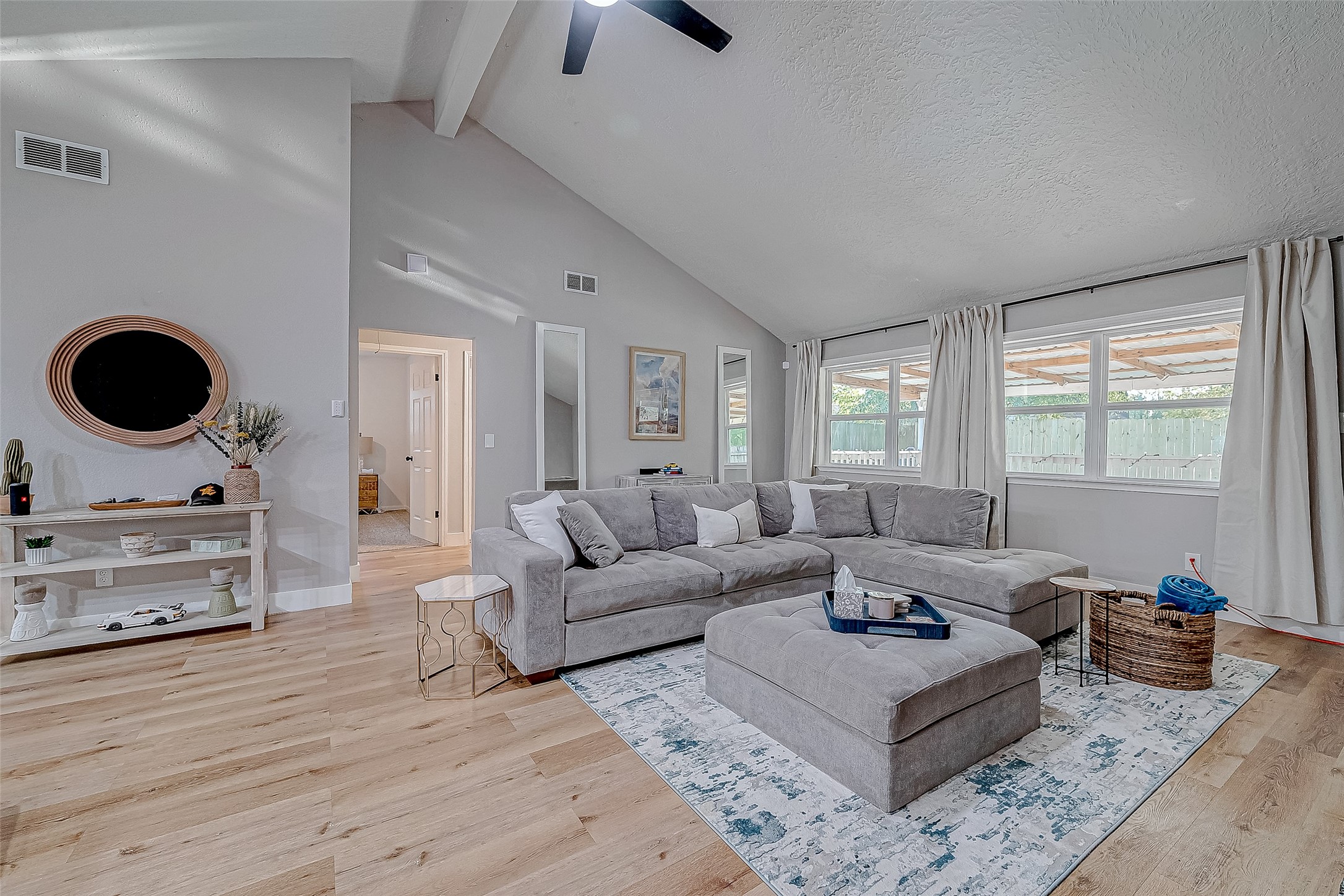 17431 Typhoon Way Crosby, TX 77532 - Photo 14 of 34 a living room with furniture and a flat screen tv