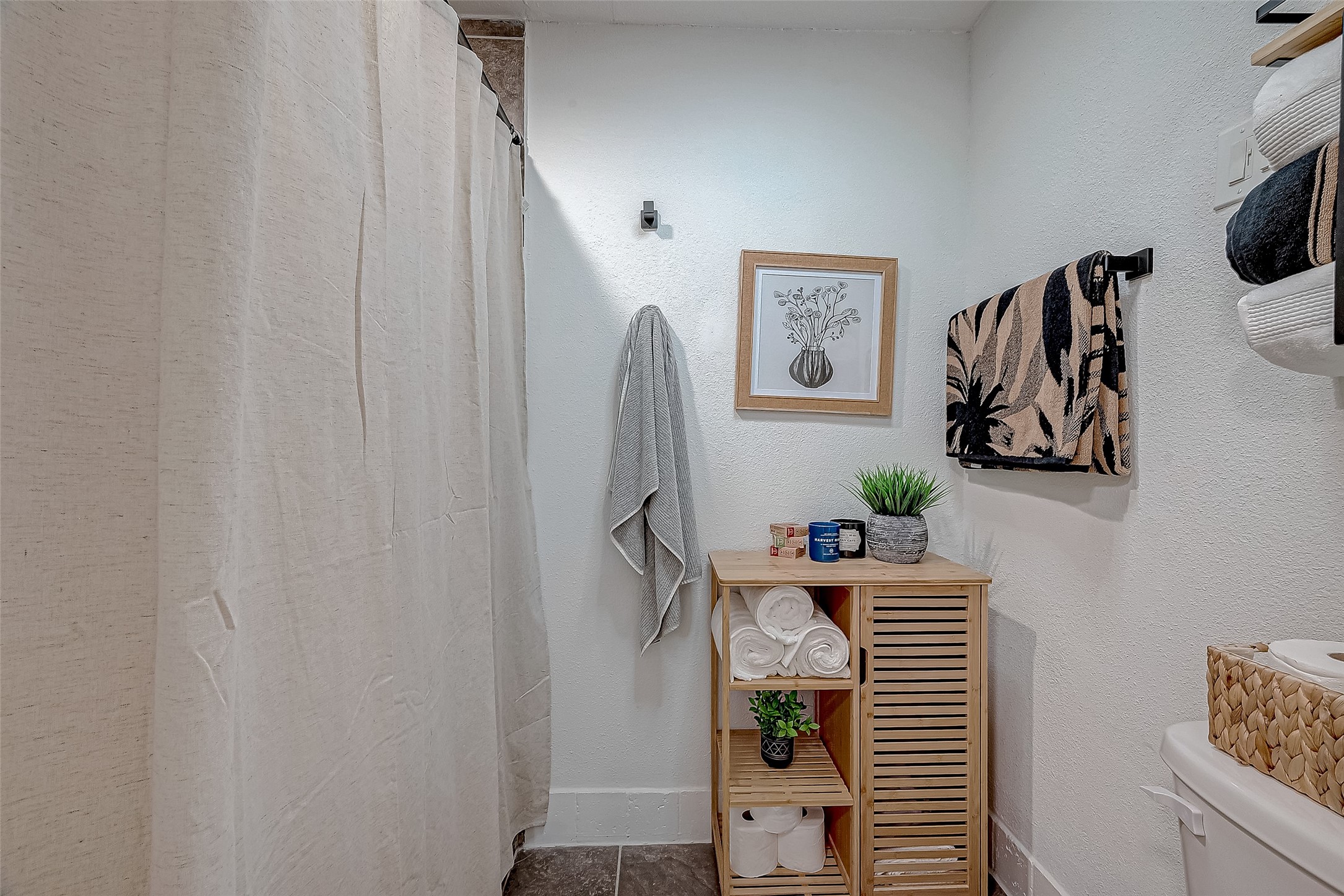 17431 Typhoon Way Crosby, TX 77532 - Photo 21 of 34 a bedroom with a bed and furniture