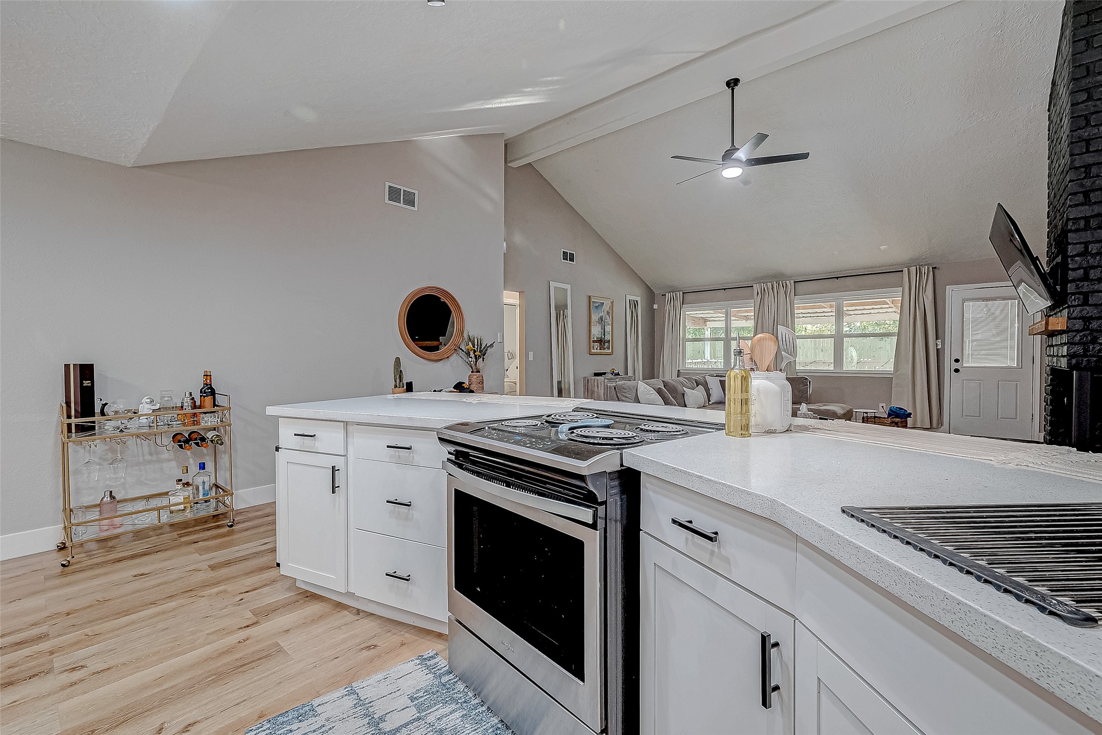 17431 Typhoon Way Crosby, TX 77532 - Photo 10 of 34 a kitchen with a stove and a sink