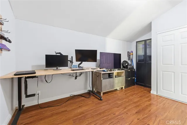 a view of a kitchen with a sink microwave and refrigerator