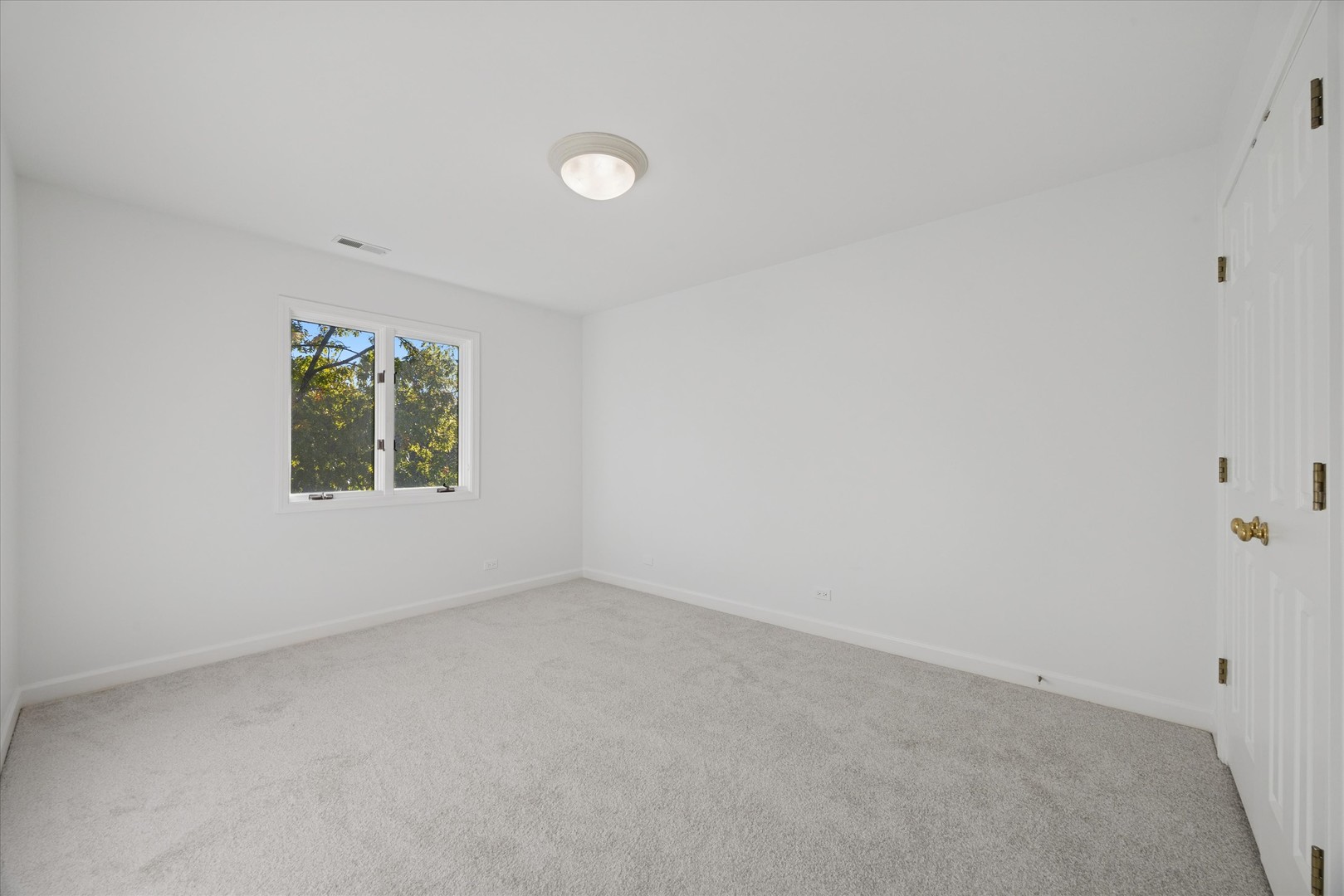 179 Foxborough Place Burr Ridge, IL 60527 - Photo 11 of 18 an empty room with a window