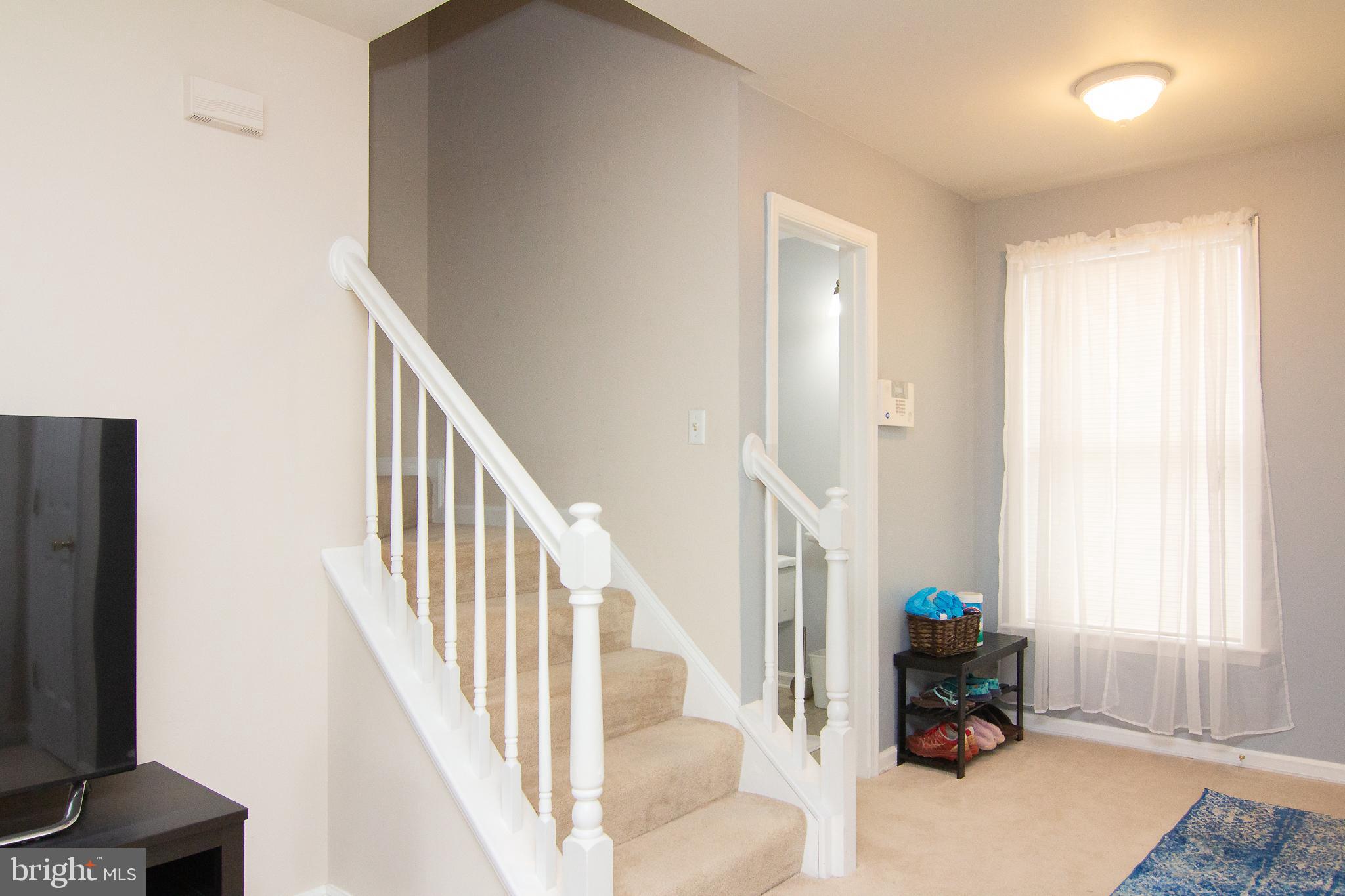 7315 Woodbine Road, Unit A Woodbine, MD 21797 - Photo 12 of 35 Stairs to upper level