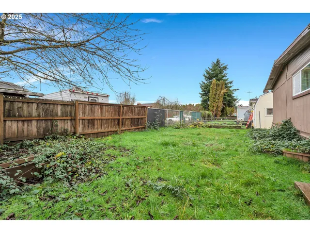 a view of backyard with green space
