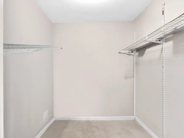 a view of a room with racks on the wall