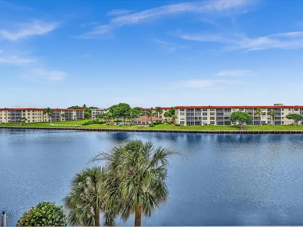 a view of a lake with a houses