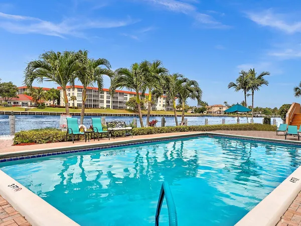 a view of a swimming pool and outdoor space