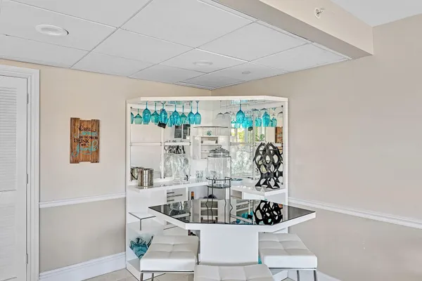 a kitchen with stainless steel appliances a refrigerator and cabinets