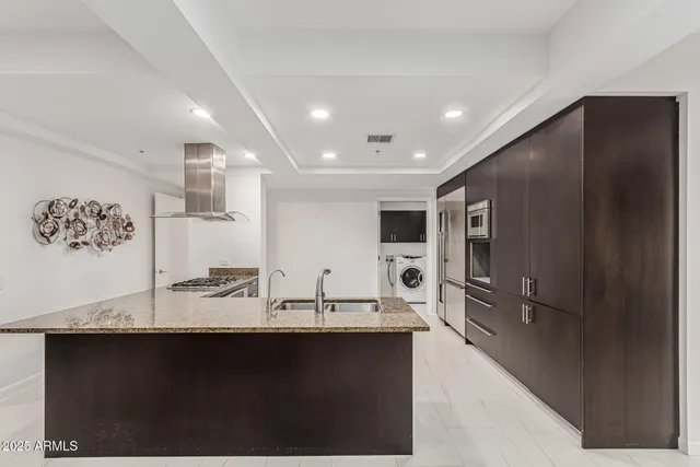 a view of a bathroom with a sink and mirror