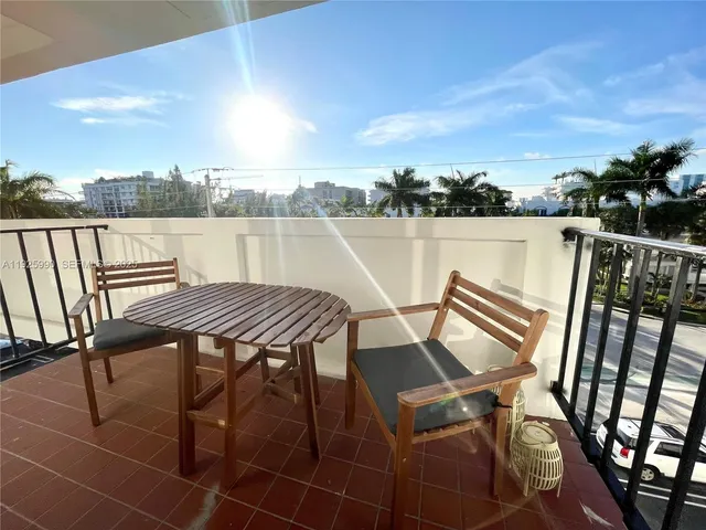 a view of a terrace with seating area