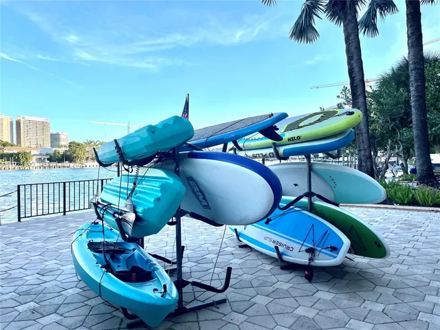 a view of a chairs and table in backyard