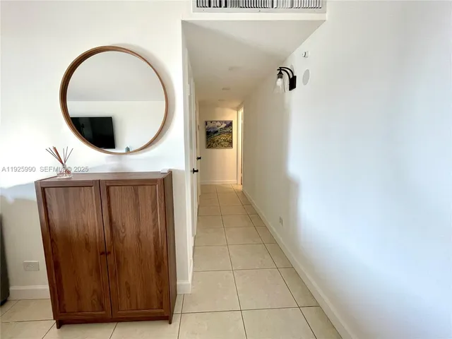 an entryway view with staircase