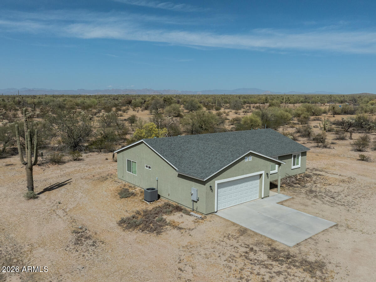 24638 East Bartlett Road Florence, AZ 85132 - Photo 2 of 21 an aerial view of house with yard
