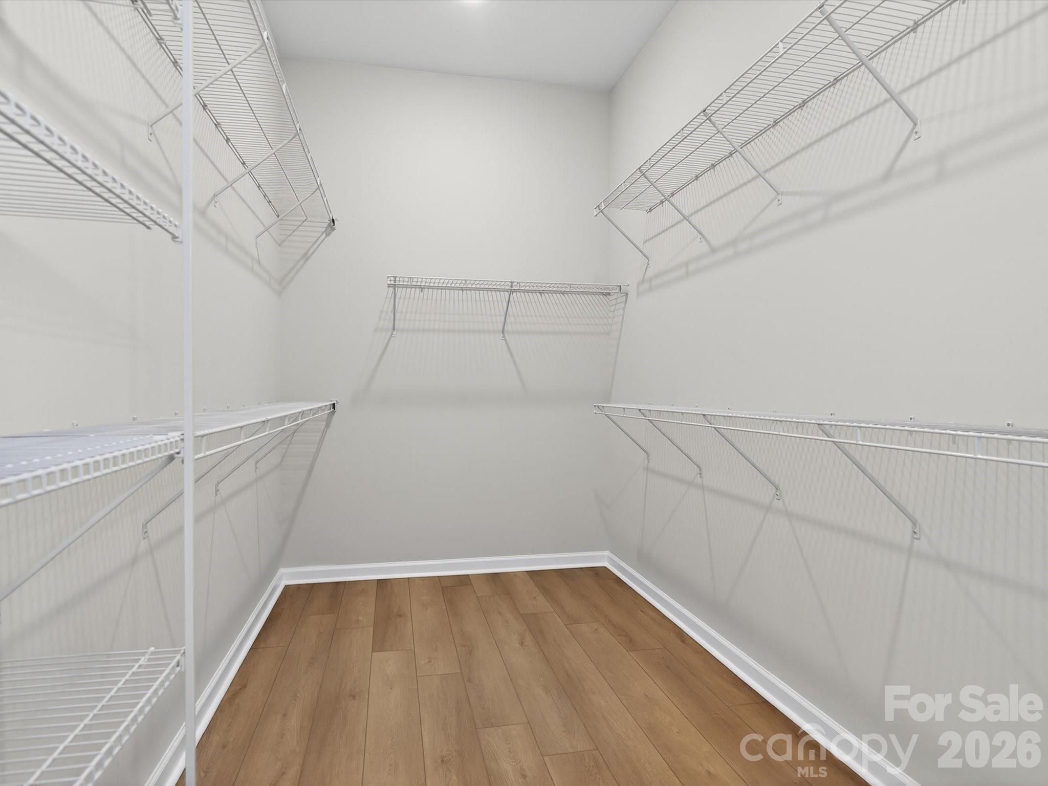 1007 Meander Lane Waxhaw, NC 28173 - Photo 14 of 35 a view of a room with racks on the wall