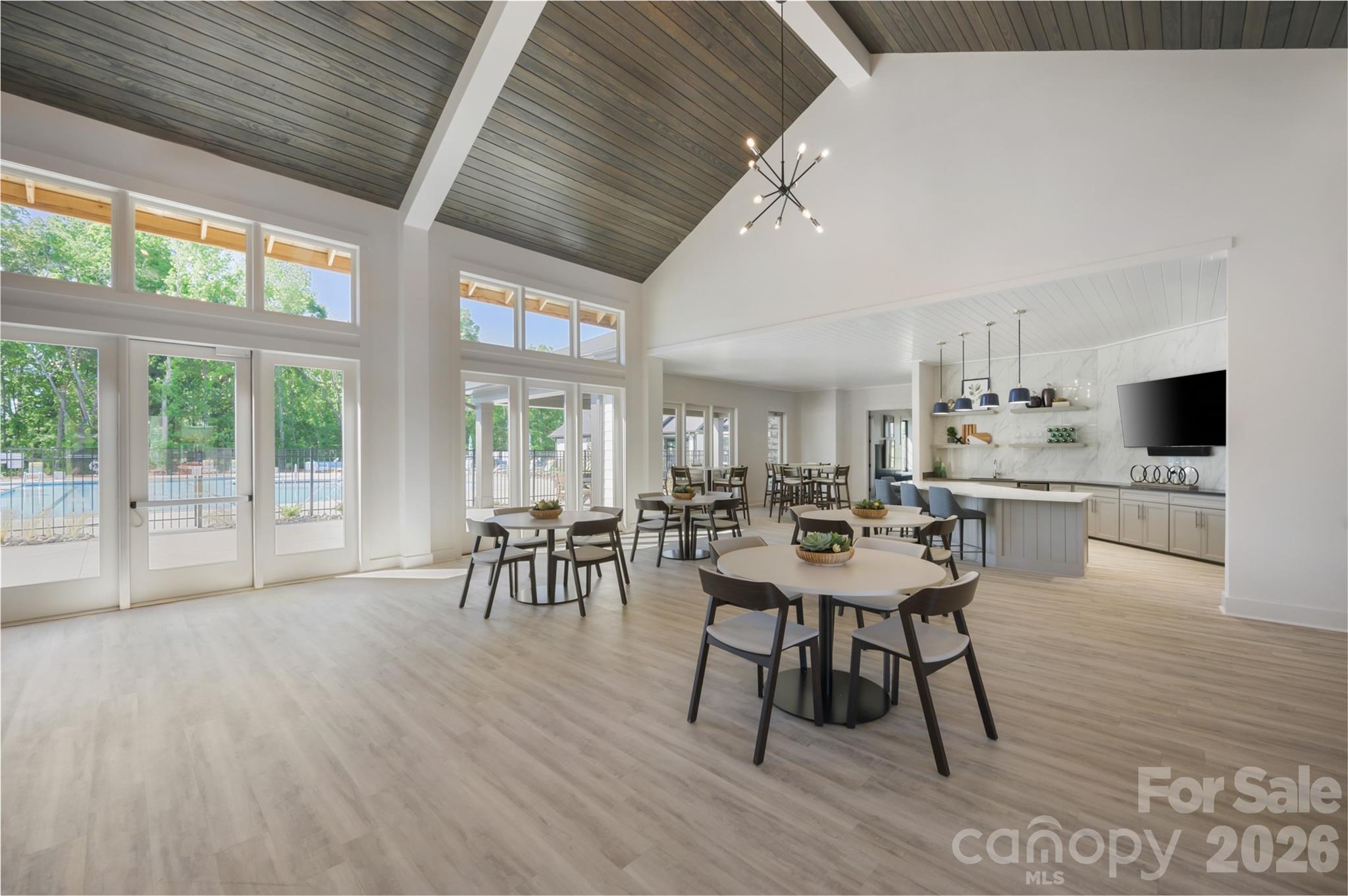 1007 Meander Lane Waxhaw, NC 28173 - Photo 23 of 35 a dining room with furniture and wooden floor