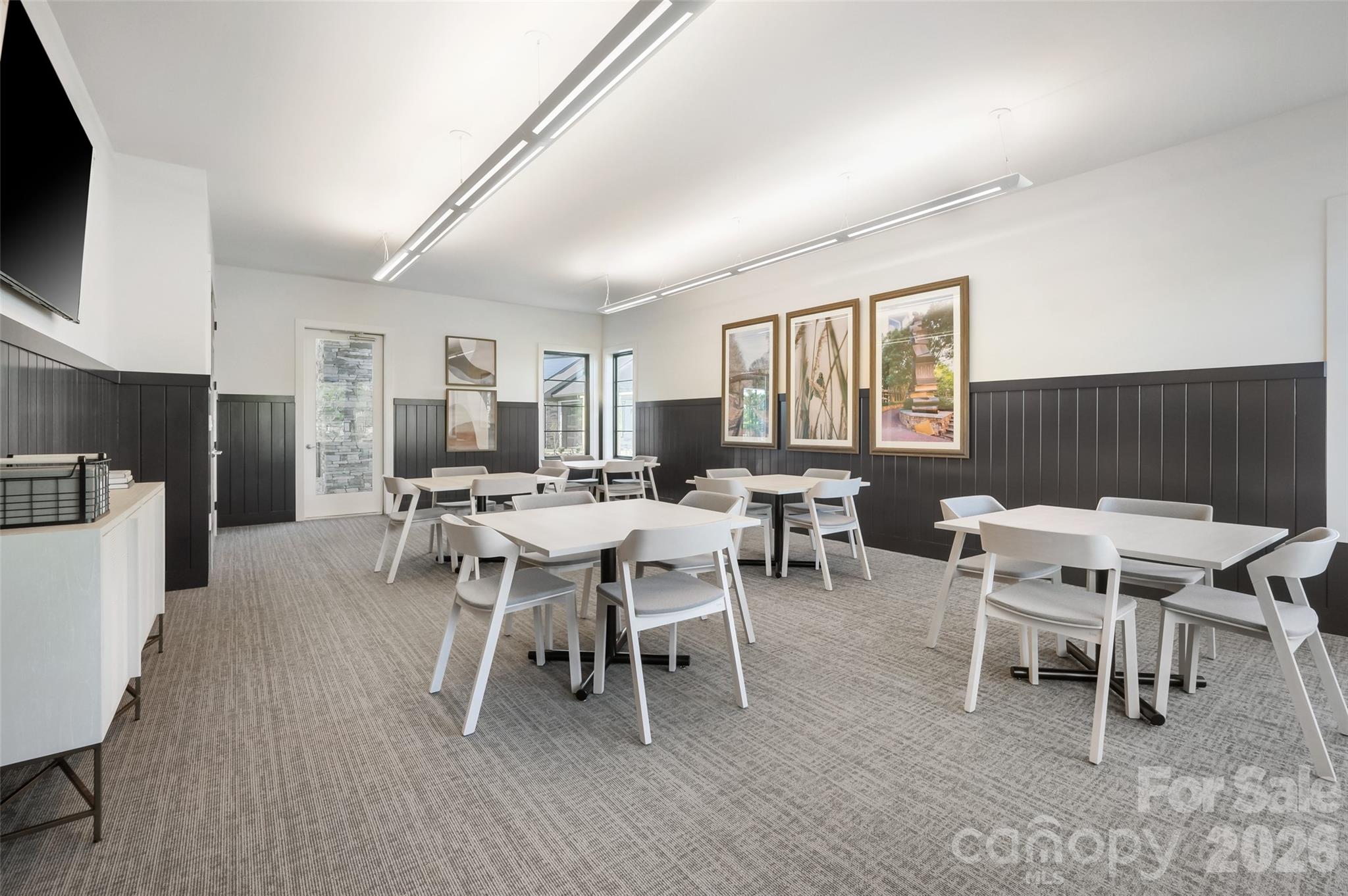1007 Meander Lane Waxhaw, NC 28173 - Photo 25 of 35 a view of a dining room with furniture window and wooden floor