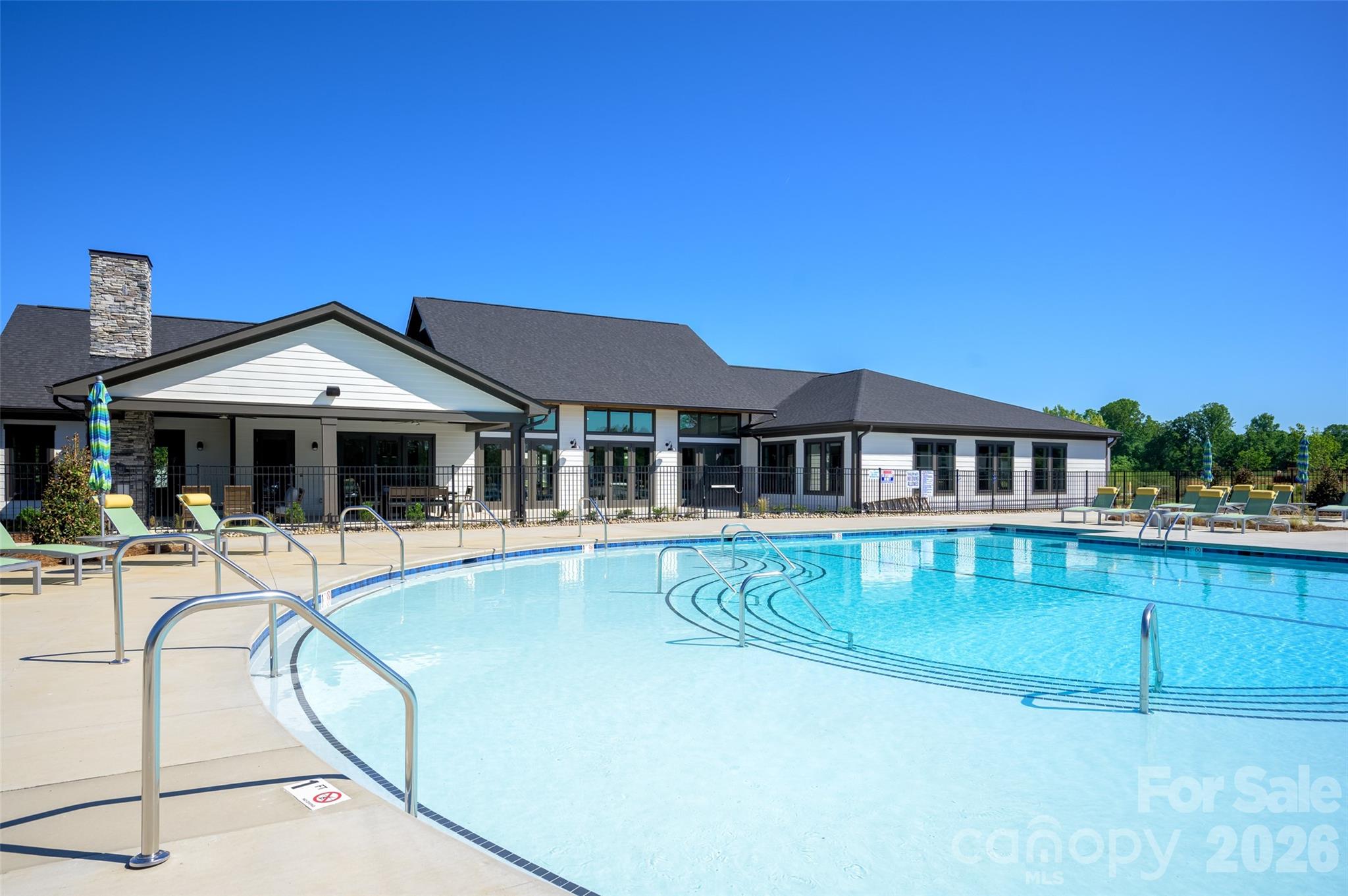 1007 Meander Lane Waxhaw, NC 28173 - Photo 28 of 35 a front view of a house with swimming pool