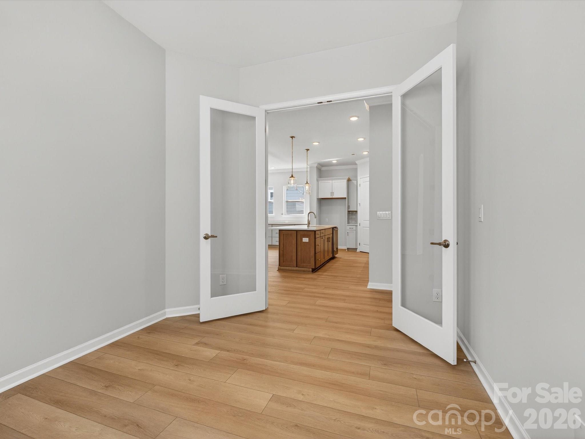 1007 Meander Lane Waxhaw, NC 28173 - Photo 6 of 35 a view of a living room with a wooden floor