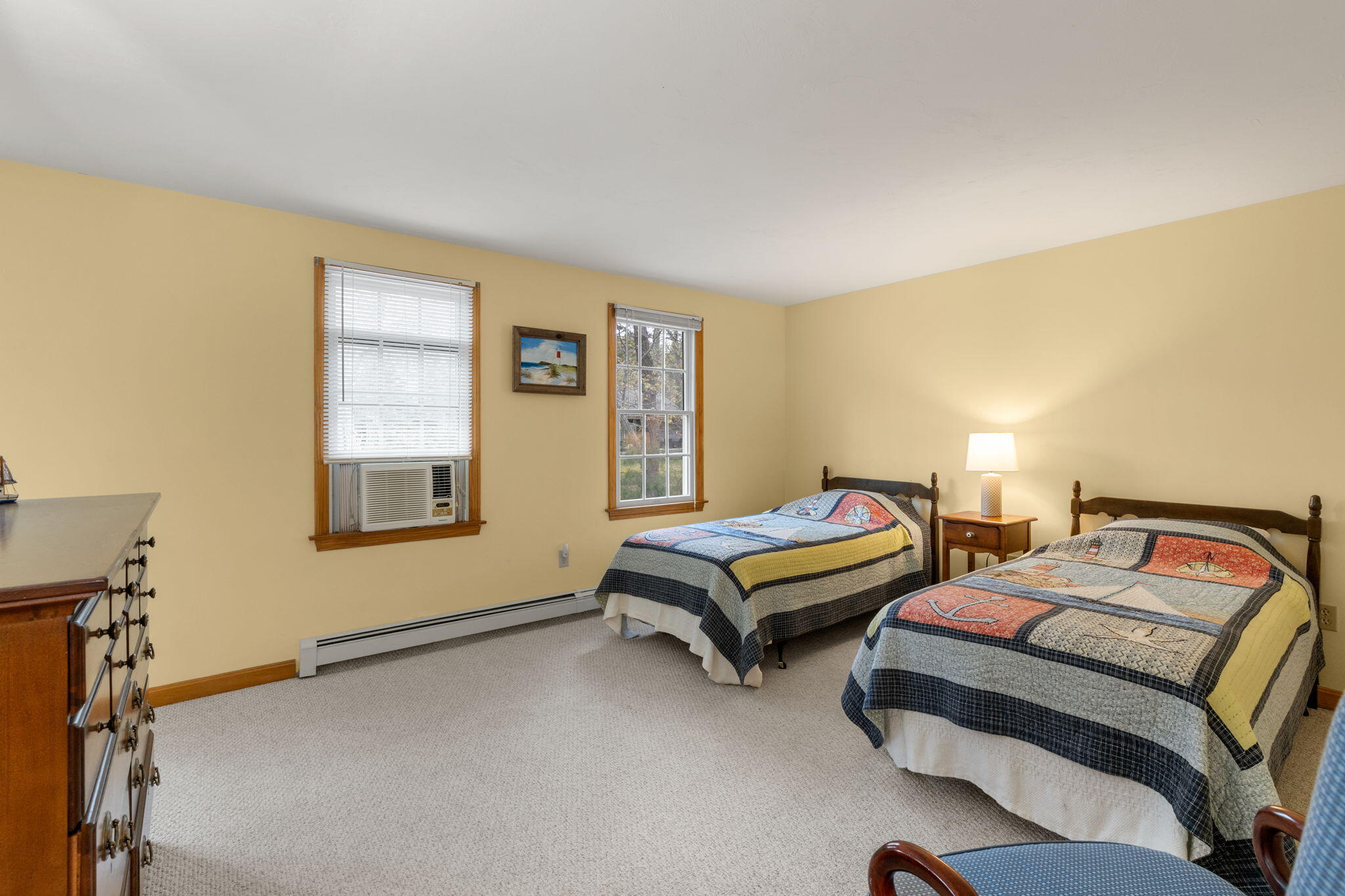 285 Blue Heron Road Wellfleet, MA 02667 - Photo 21 of 31 a bedroom with two beds and a window