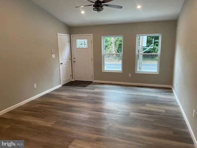 a view of a bathroom from the hallway