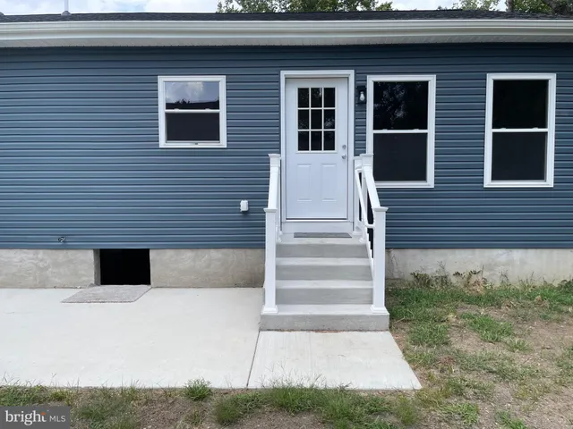 a view of house with outdoor space