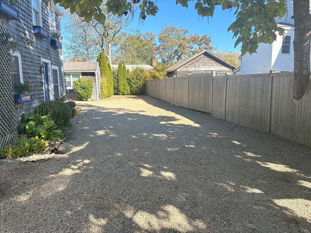 25 Simpson's Lane Edgartown, MA 02539 - Photo 5 of 18 a view of a house with a yard