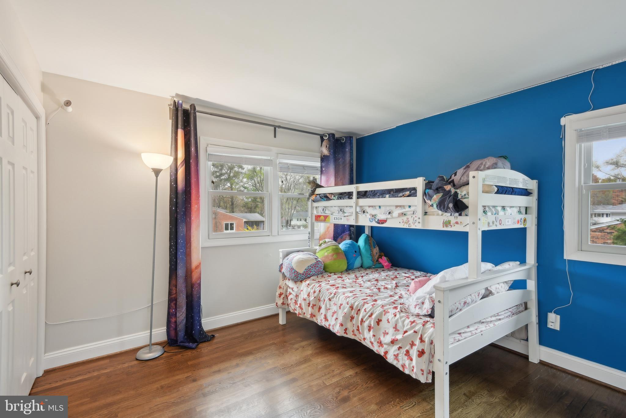 505 Devonshire Drive Northeast Vienna, VA 22180 - Photo 17 of 46 a bedroom with a bed and a window