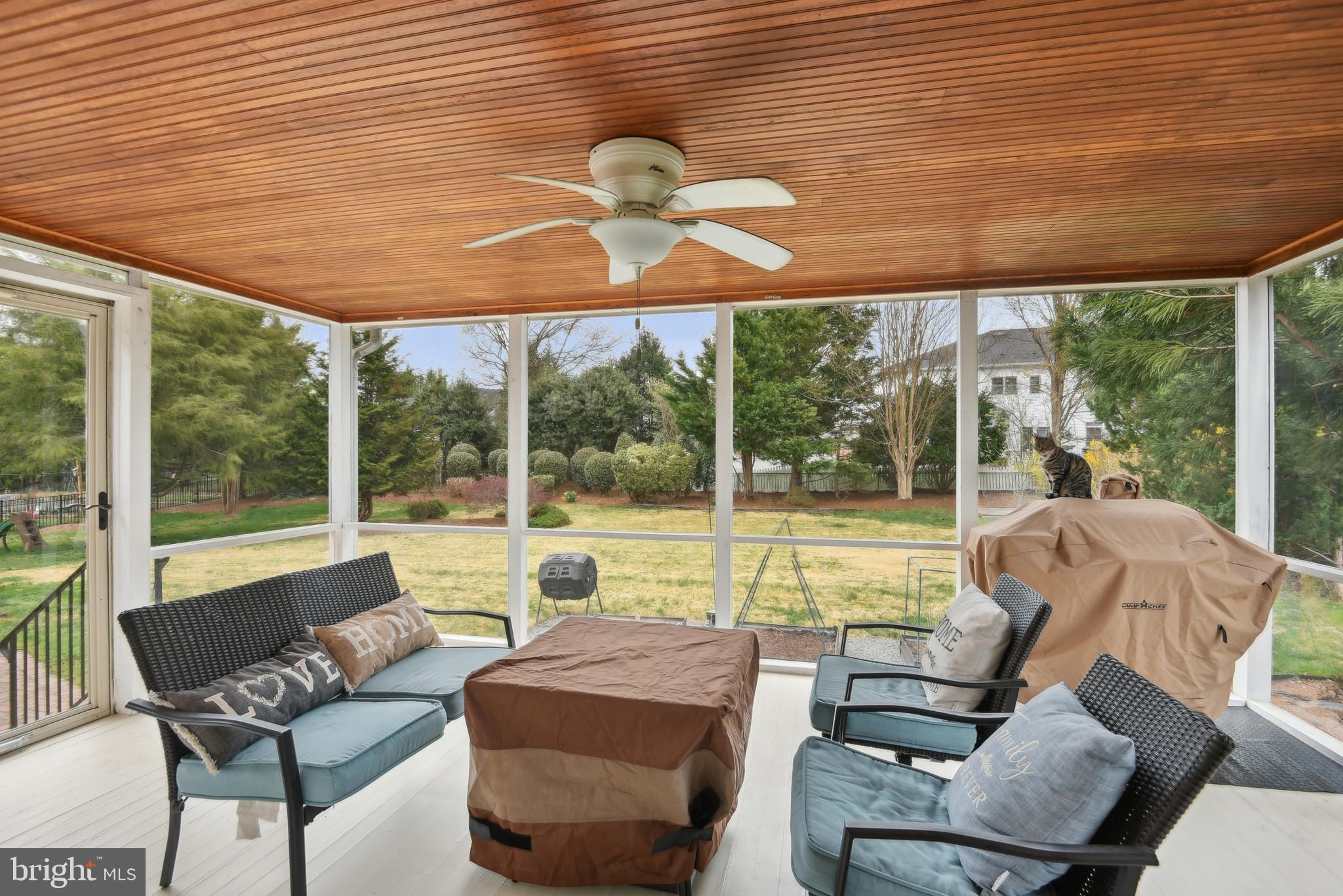 505 Devonshire Drive Northeast Vienna, VA 22180 - Photo 24 of 46 a living room with furniture and a floor to ceiling window