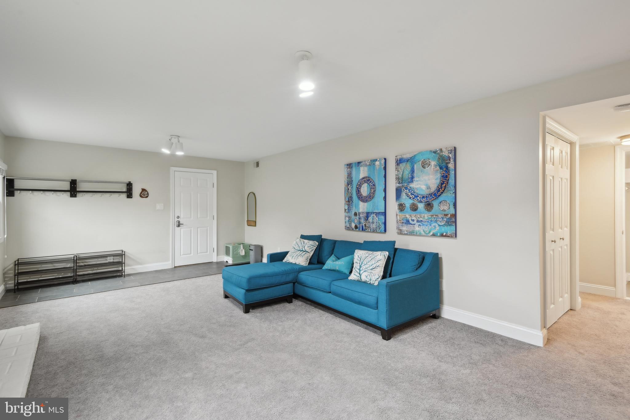 505 Devonshire Drive Northeast Vienna, VA 22180 - Photo 26 of 46 a living room with furniture and a air conditioner vent