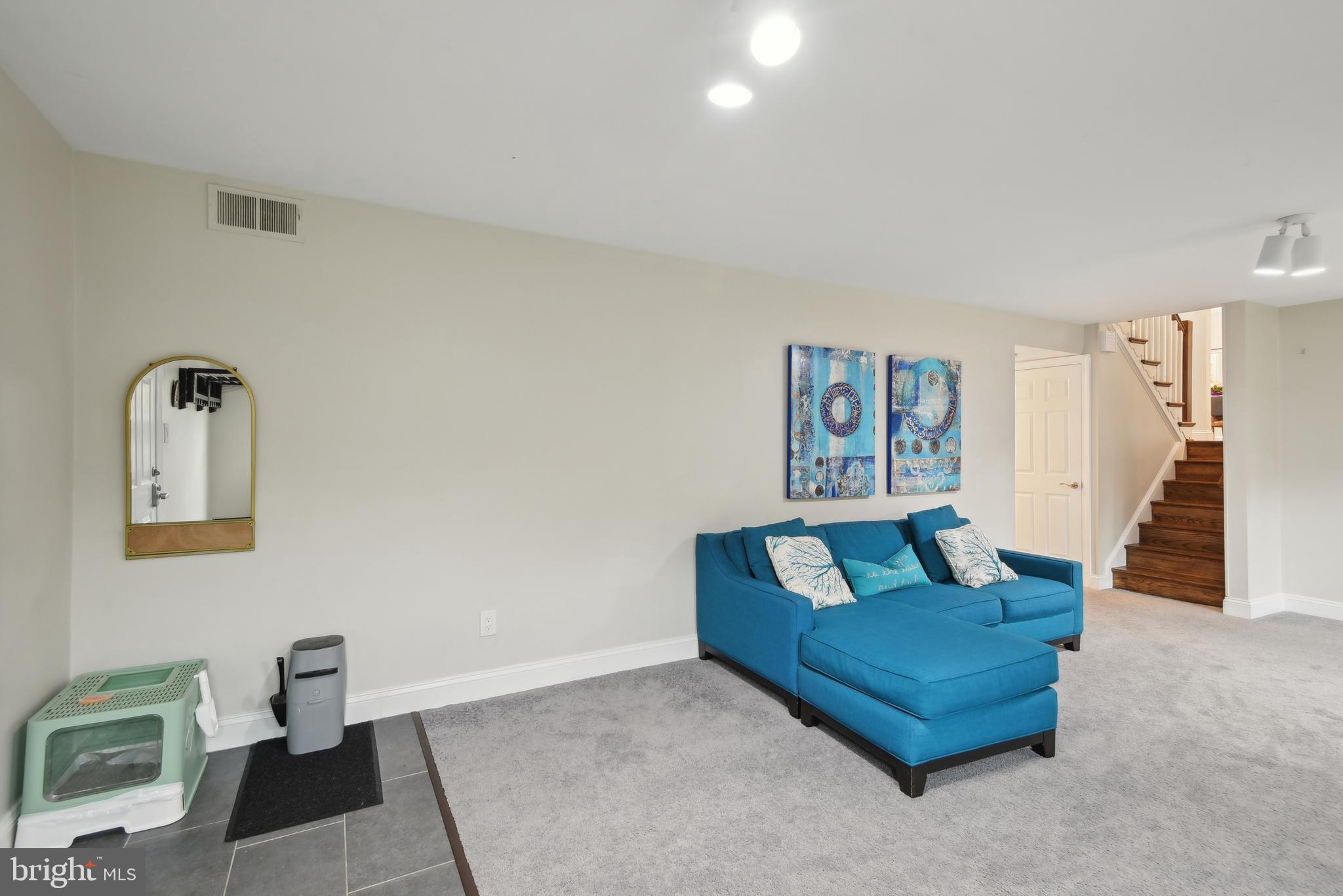 505 Devonshire Drive Northeast Vienna, VA 22180 - Photo 27 of 46 a living room with furniture and a wooden floor
