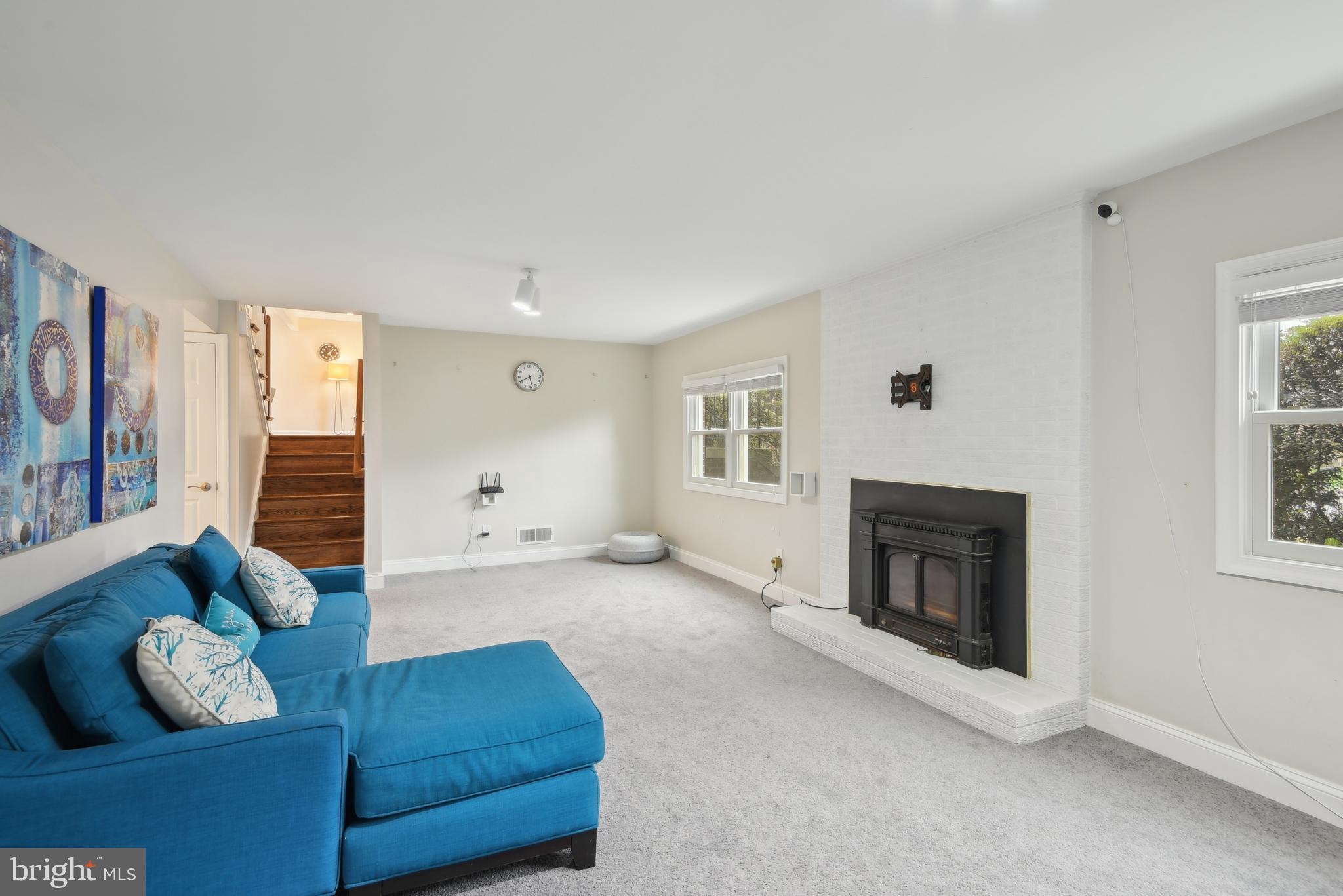 505 Devonshire Drive Northeast Vienna, VA 22180 - Photo 28 of 46 a living room with furniture and a fireplace