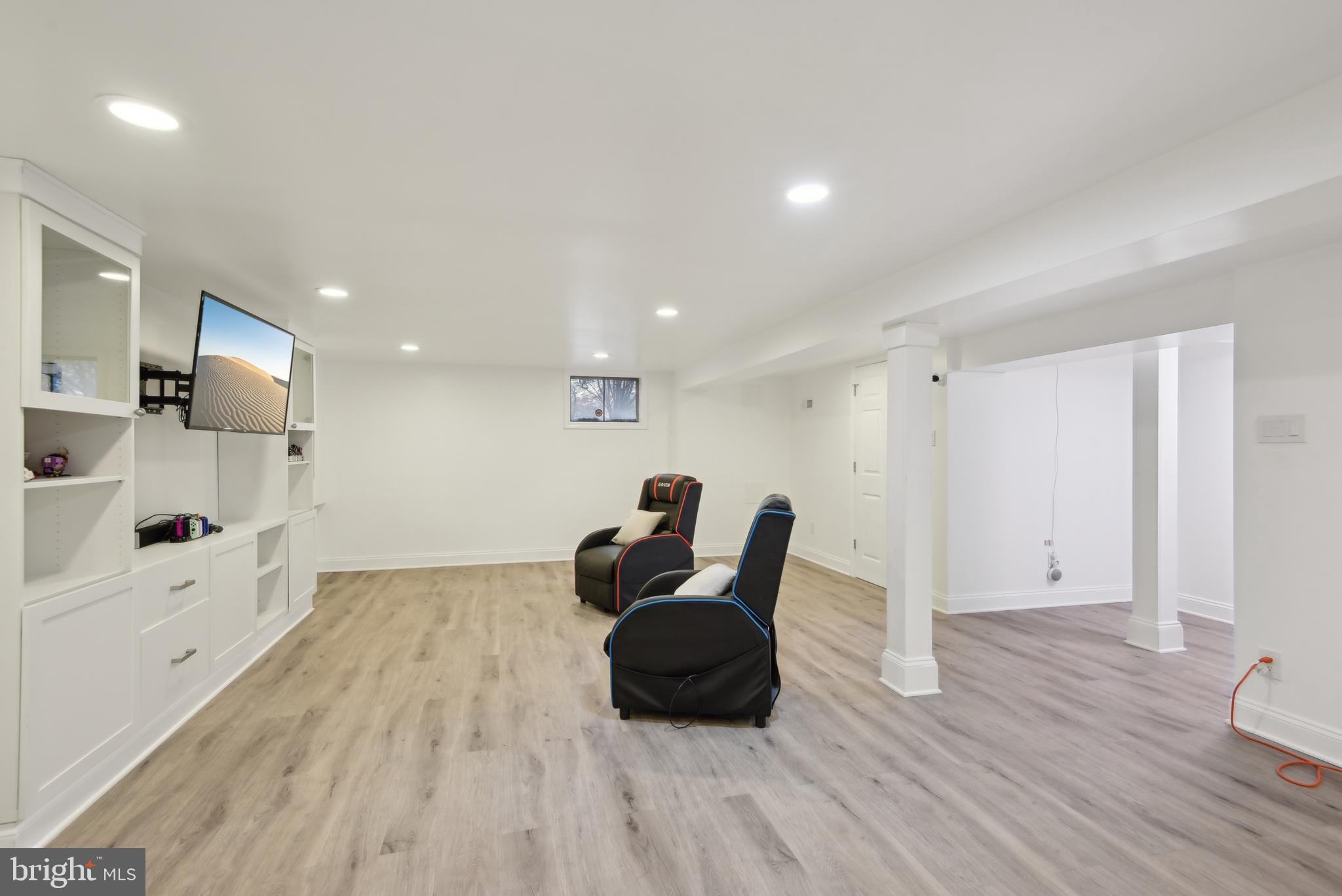 505 Devonshire Drive Northeast Vienna, VA 22180 - Photo 34 of 46 a living room with furniture and wooden floor