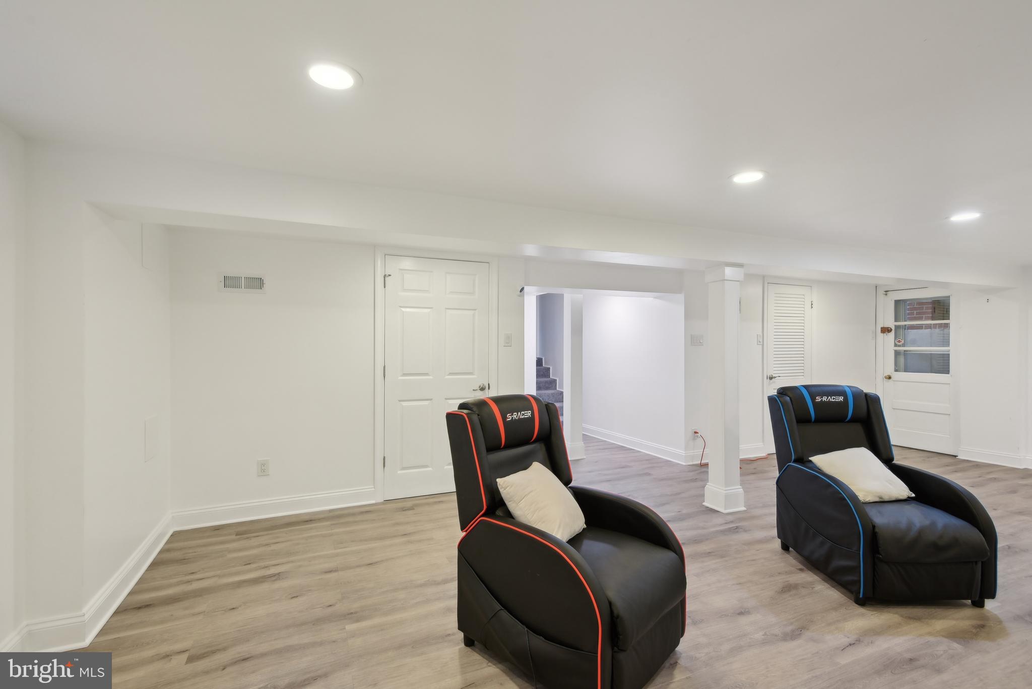 505 Devonshire Drive Northeast Vienna, VA 22180 - Photo 35 of 46 a room with furniture and stairs